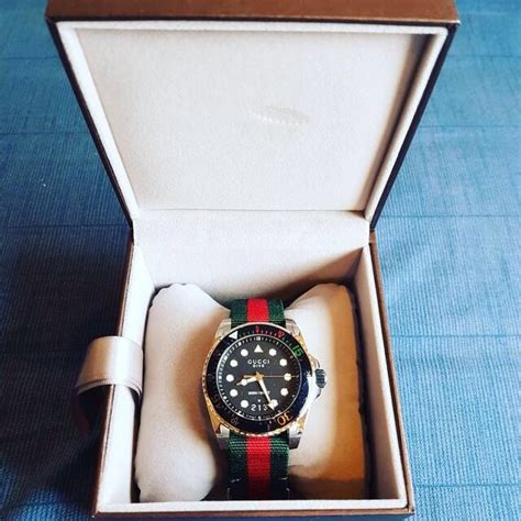 gucci jam tangan original.